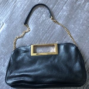 MICHAEL KORS - Like new, leather clutch purse.